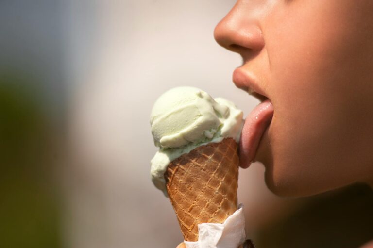 woman licking ice cream